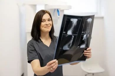 xray tech holding xrays at urgent care
